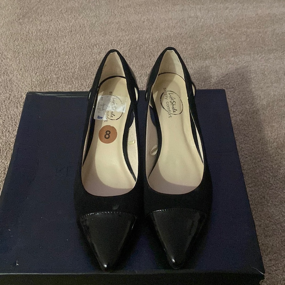 All black size 8 shirt heel shoe